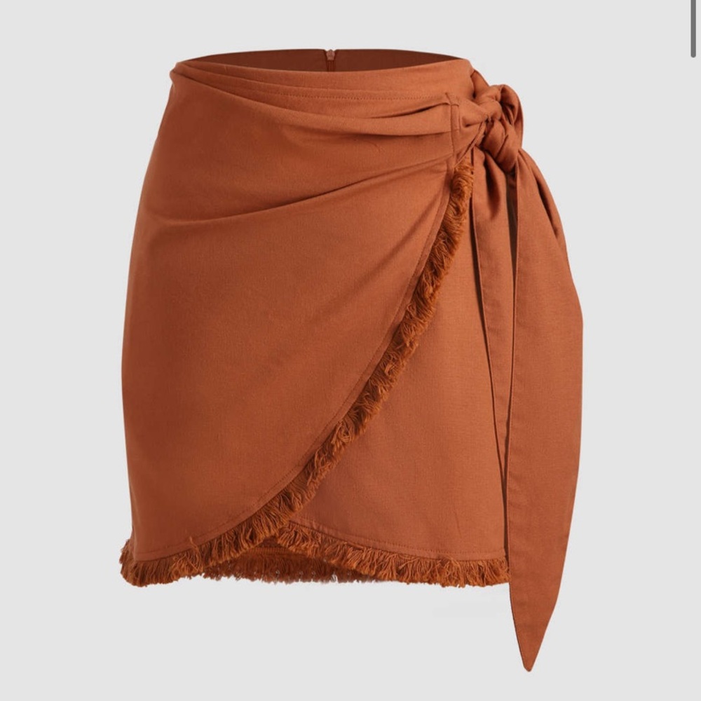 Fringe side tie wrap mini skirt. Linen/cotton.